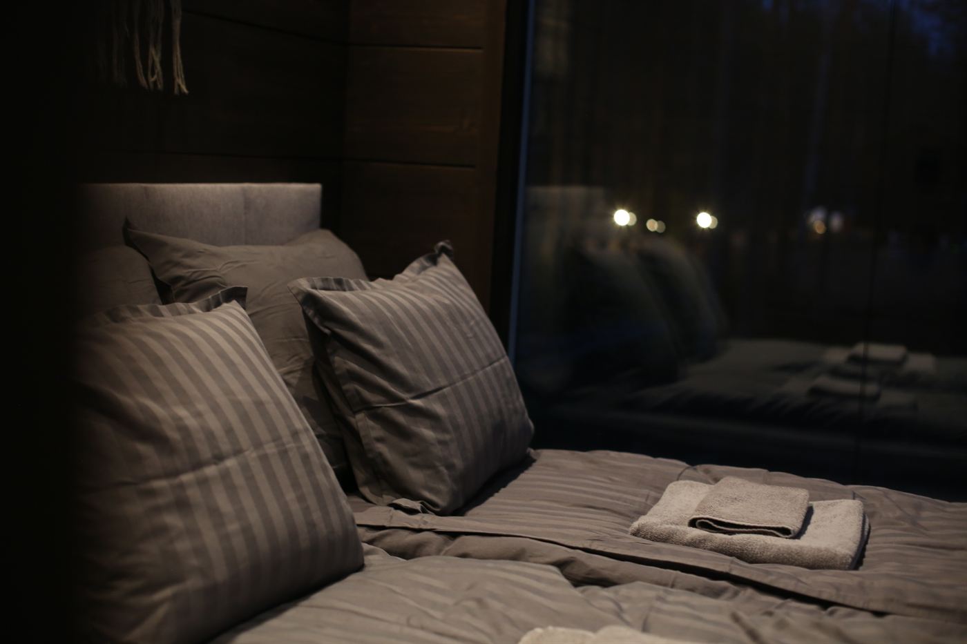 Bed made up with soft linen