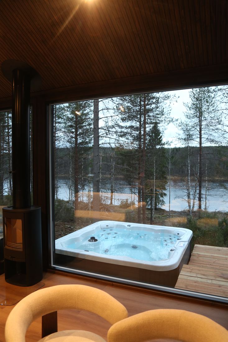 View from the lounge chairs to the hot tub and the river
